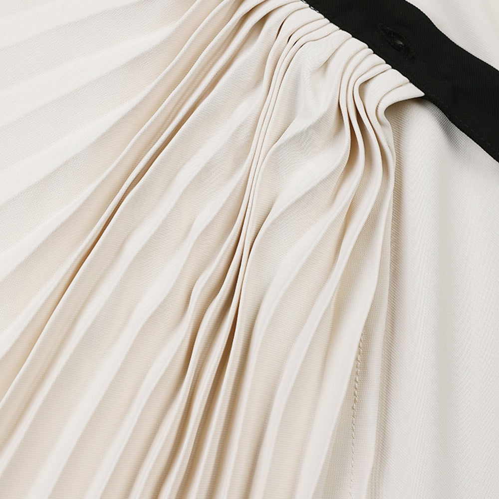 Color blocked pleated irregular long sleeved shirt for women's casual personality single breasted silhouette milky white shirt