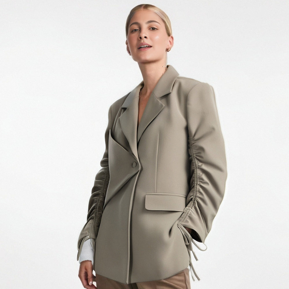 A niche suit top for women's autumn new style with drawstring design personalized loose jacket