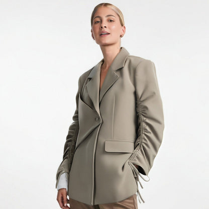 A niche suit top for women's autumn new style with drawstring design personalized loose jacket