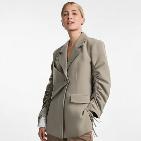 A niche suit top for women's autumn new style with drawstring design personalized loose jacket